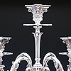 Central top candle holder with ornate detailing to the silver sconces 