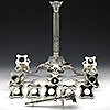 Deconstructed silver antique silver candelabra components