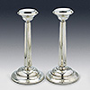 Pair of tapered convex sterling silver matched candlesticks