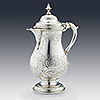 Side profile of arts and crafts silver coffee pot