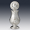 Rear view of silver coffee pot with lid open
