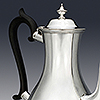 Upper section of silver coffee pot showing beaded perimeter
