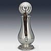 Rear view of handle and top of coffee pot lid