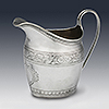 Bright cut engraving to silver cream jug