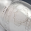 Bright cut engraving to cartouche, hand engraved patterning to cream jug perimeters