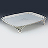 Rectangular Georgian silver teapot stand with four corner claw feet