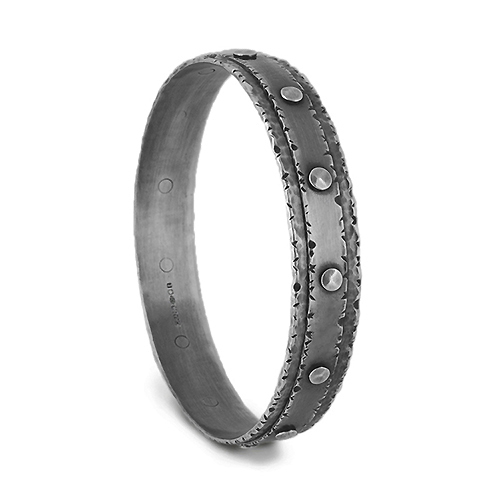 Oxidised finished 10mm wide round riveted layered bangle