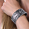 Model showing sterling silver cuff bangle on wrist