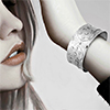 Model showing sterling silver cuff bangle on wrist