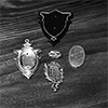 Broken sterling silver sheild pendant and locket