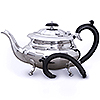 Repaired silver teapot handle